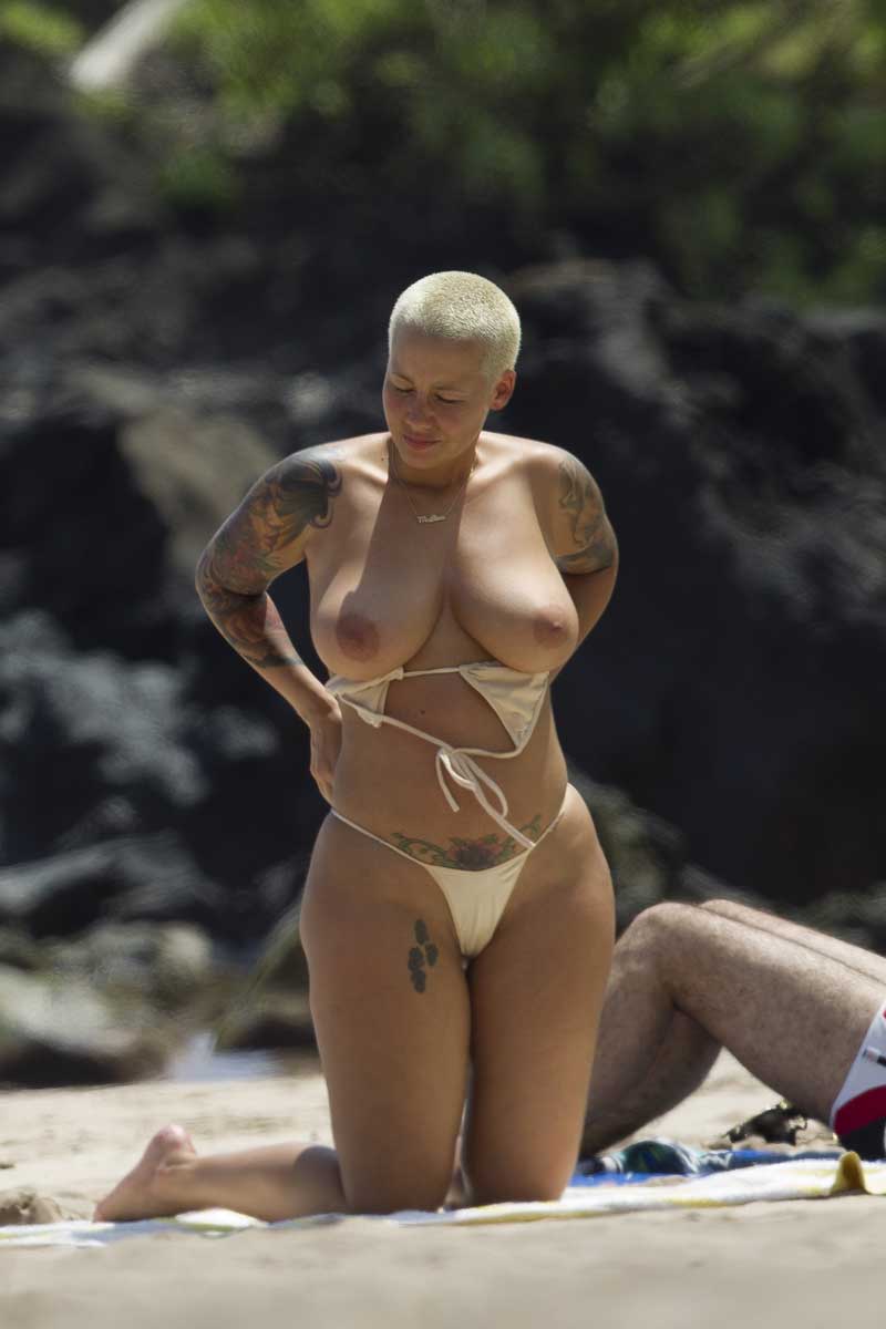 Amber Rose Sunbathing Topless