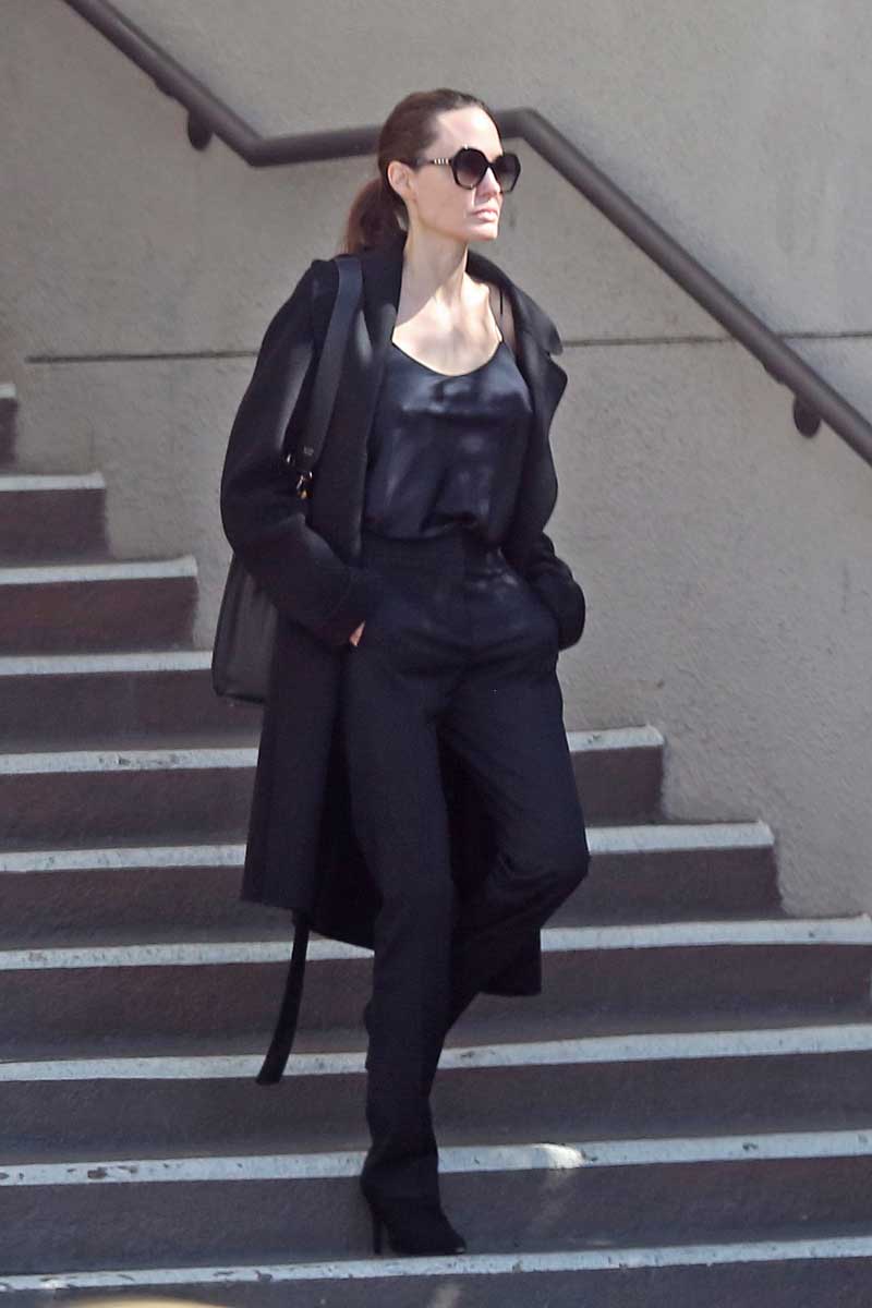 Angelina Jolie Pokies in Silk Shirt