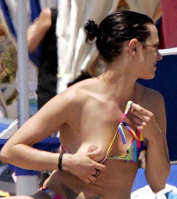 Asia Argento Topless Beach Magazine Articles