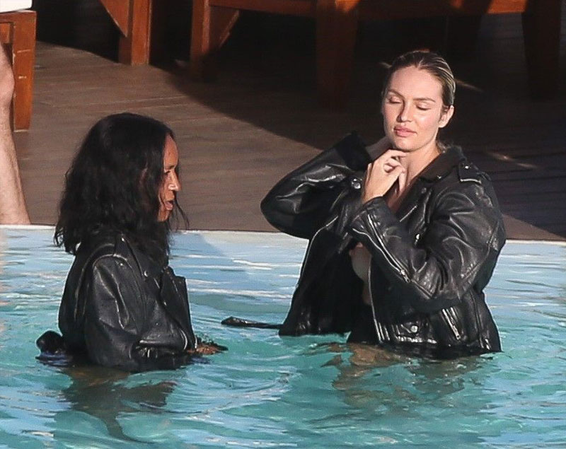 Candice Swanepoel Nip Slip in Leather Jacket in a Pool