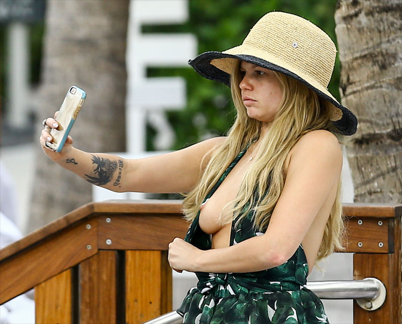 Chanel West Coast Caught With Her Boob Out Taking a Selfie Taxi.