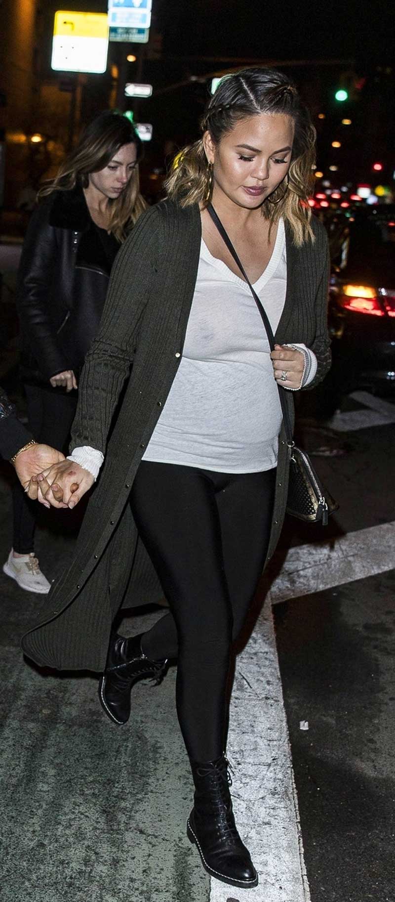 Chrissy Teigen Braless in See Through White Top