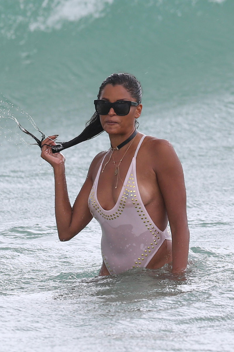 Claudia Jordan in a Wet White See Through Bikini