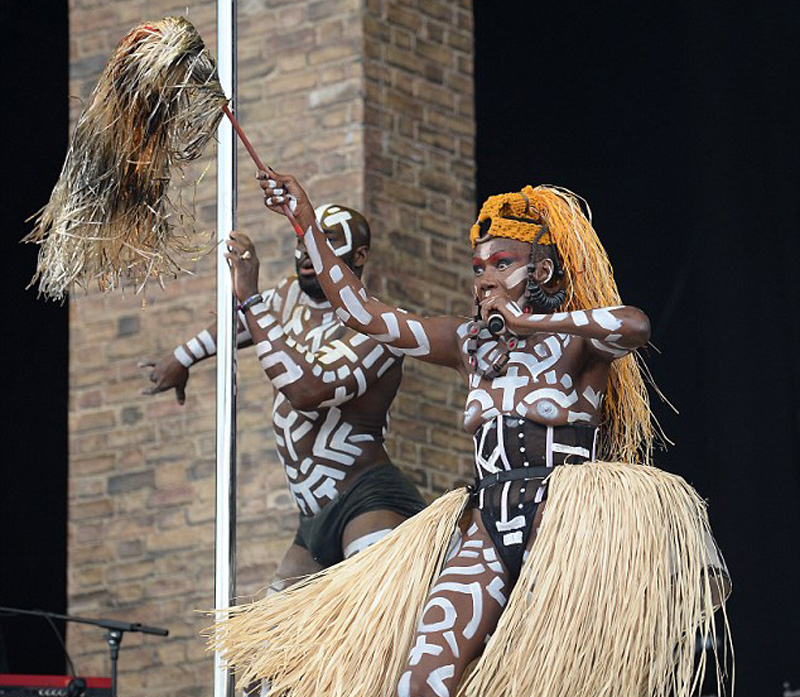 Grace Jones Topless and Painted on Stage
