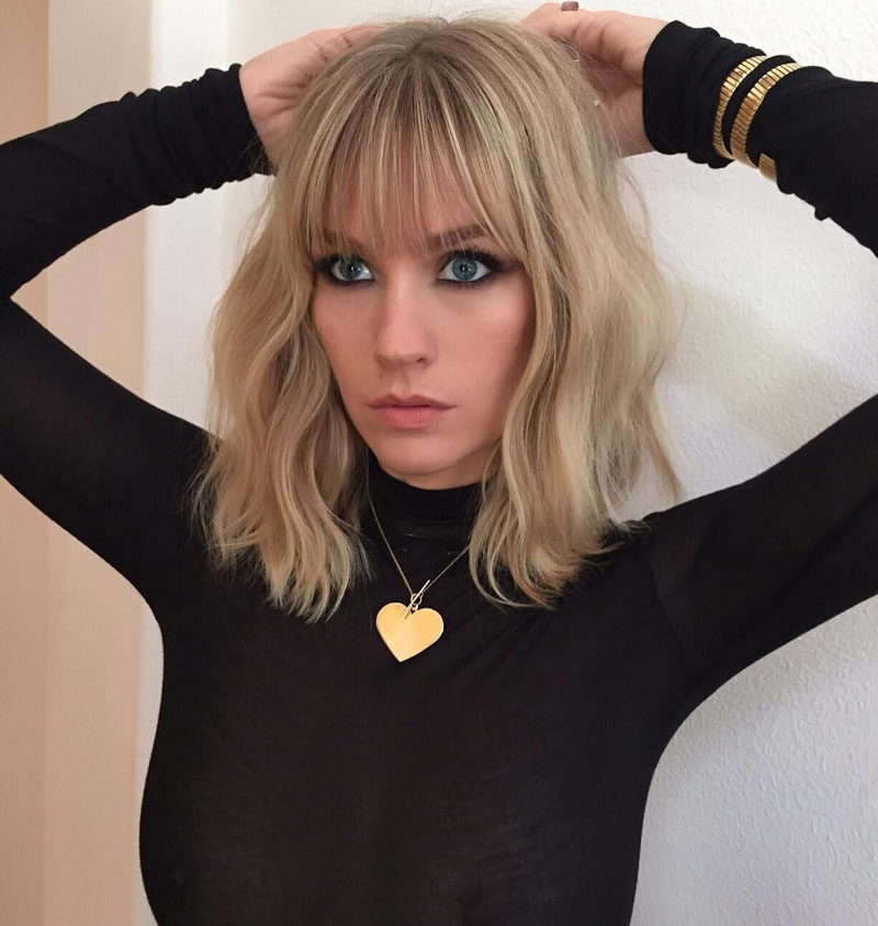 January Jones No Bra in See Through Black Turtle Neck