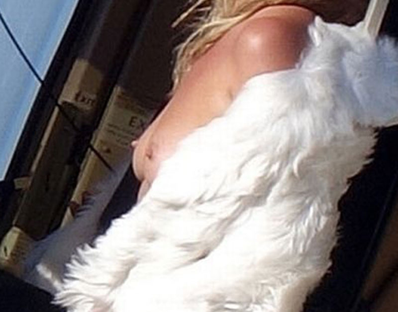 Kate Moss Posing Topless on a Helicopter