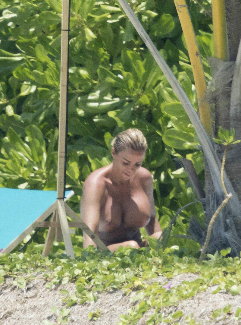 Katie Price Caught Topless on an Empty Beach