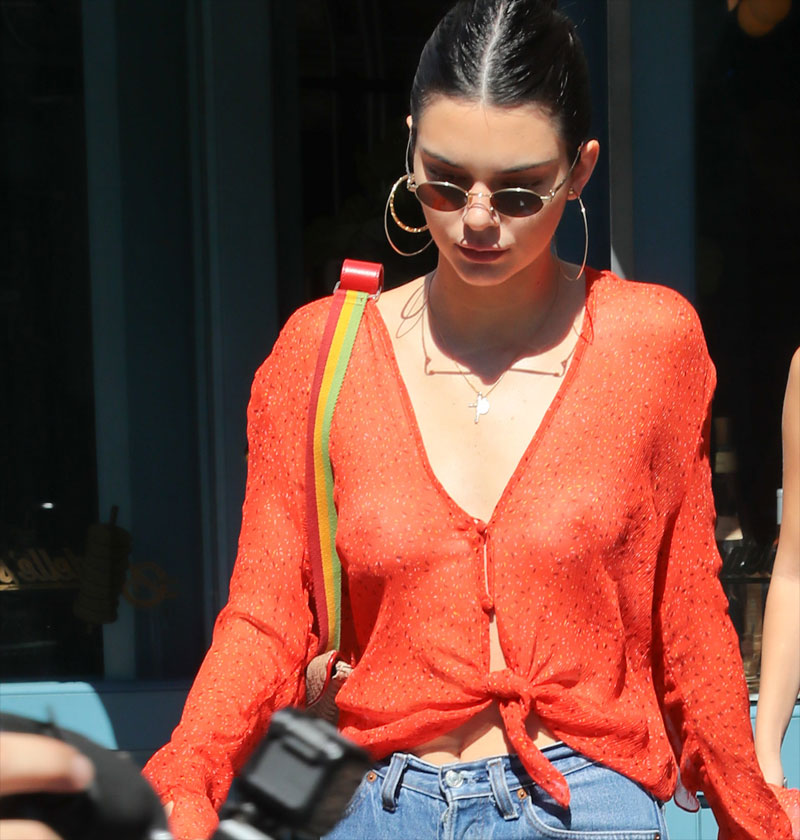 Kendall Jenner No Bra in See Through Red Blouse.