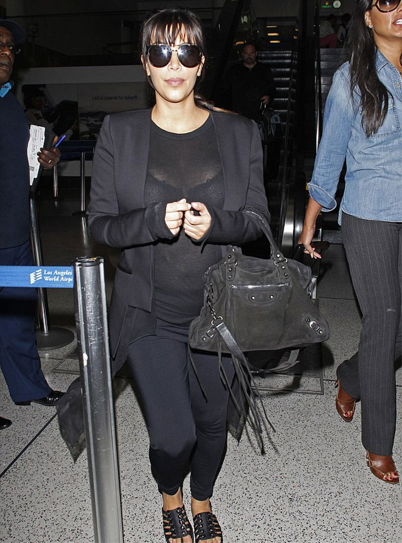 Kim Kardashian’s Big Black Bra Thru Her Shirt