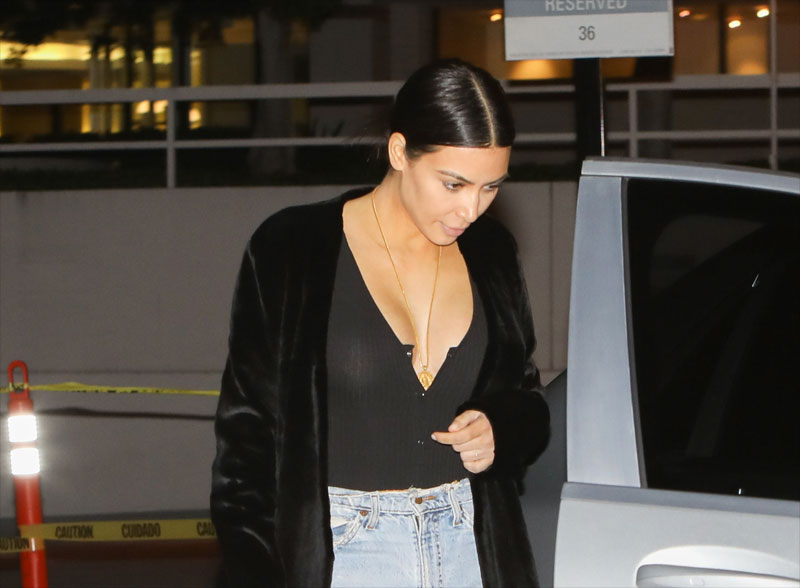 Kim Kardashian Braless in Slightly See Through Black Top