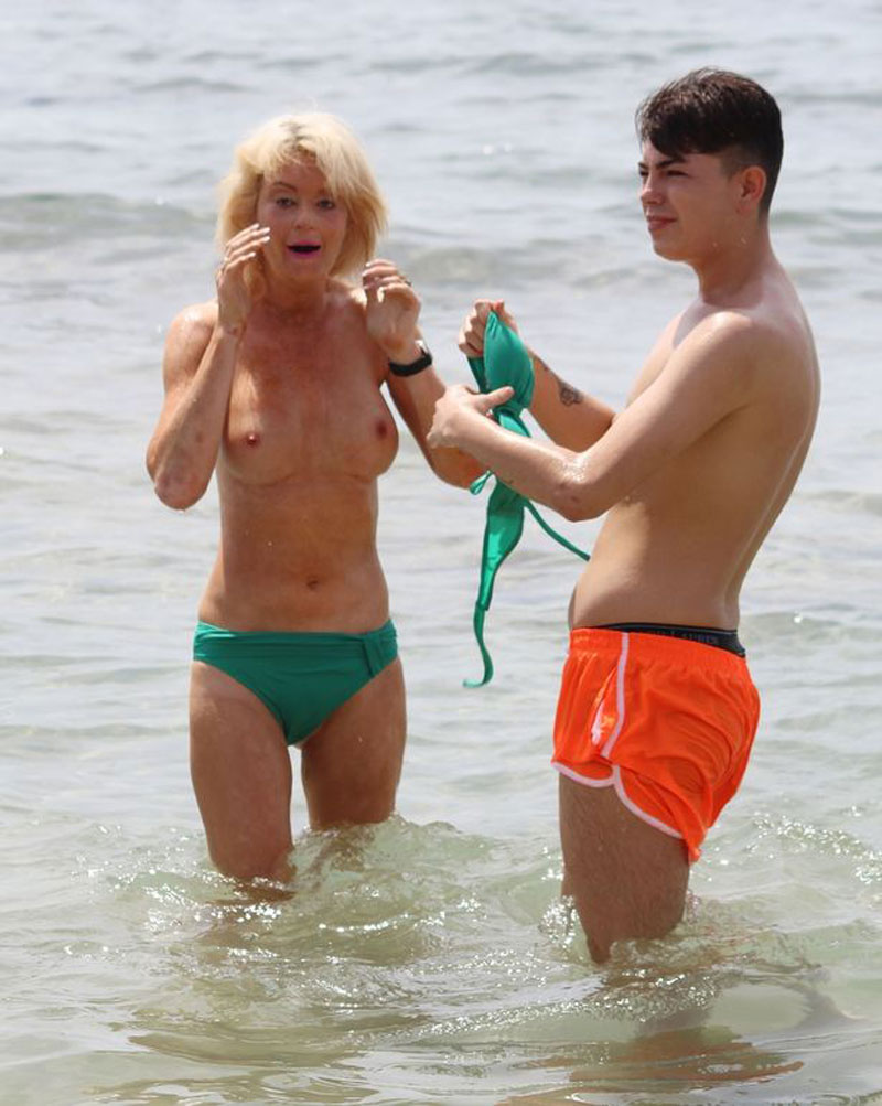 Lauren Harries Caught Topless on the Beach