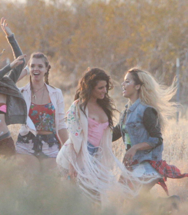 Lea Michelle Slips a Nip on her New Music Video Set