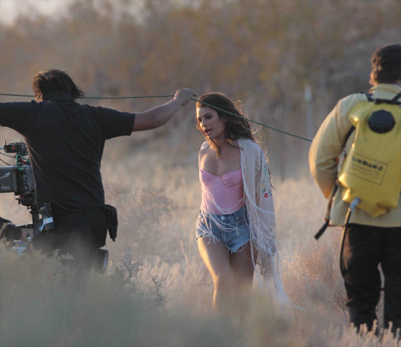 Lea Michelle Slips a Nip on her New Music Video Set