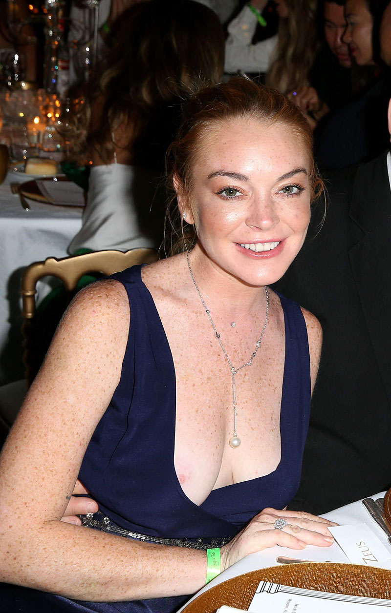 Lindsay Lohan Slips a Nipple While Out for Dinner picture