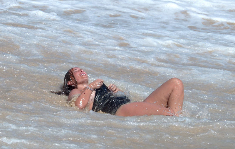 Louise Redknapp Loses her Bathing Suit in the Surf