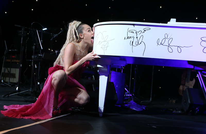 Miley Cyrus Pink Pantie Upskirt while Licking a Piano