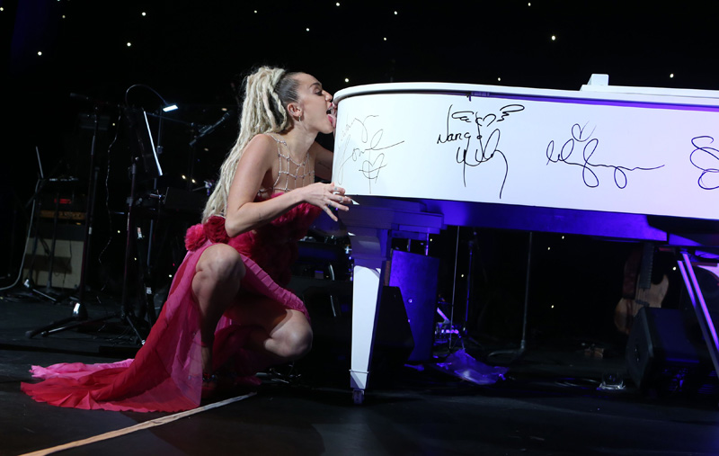 Miley Cyrus Pink Pantie Upskirt while Licking a Piano