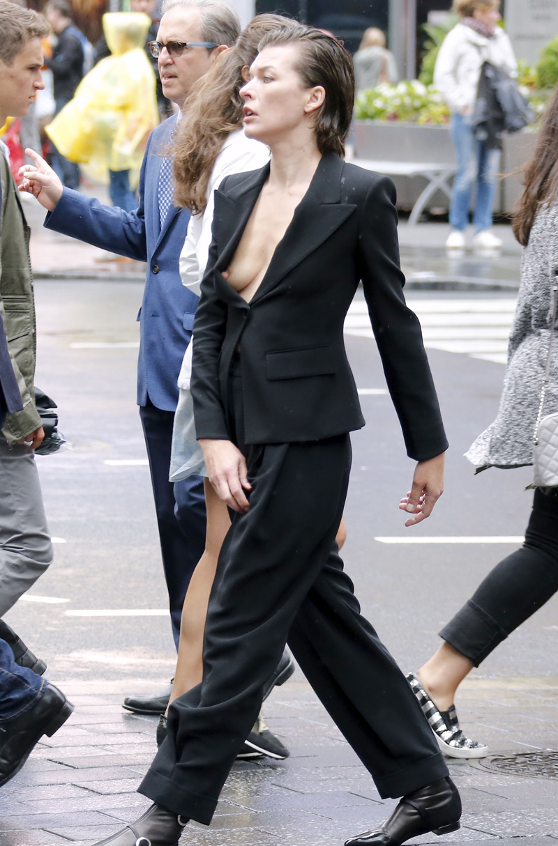 Milla Jovovich Nipple Slip on the Street