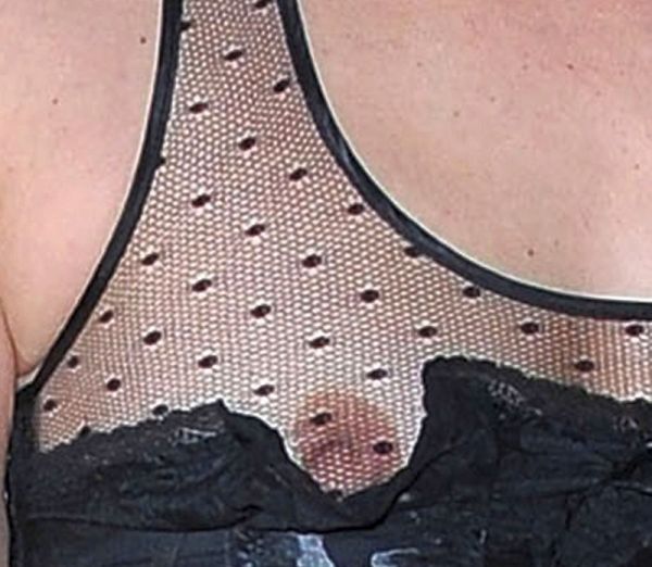 Milla Jovovich See Through Nipple Peek. Click Pic For More!