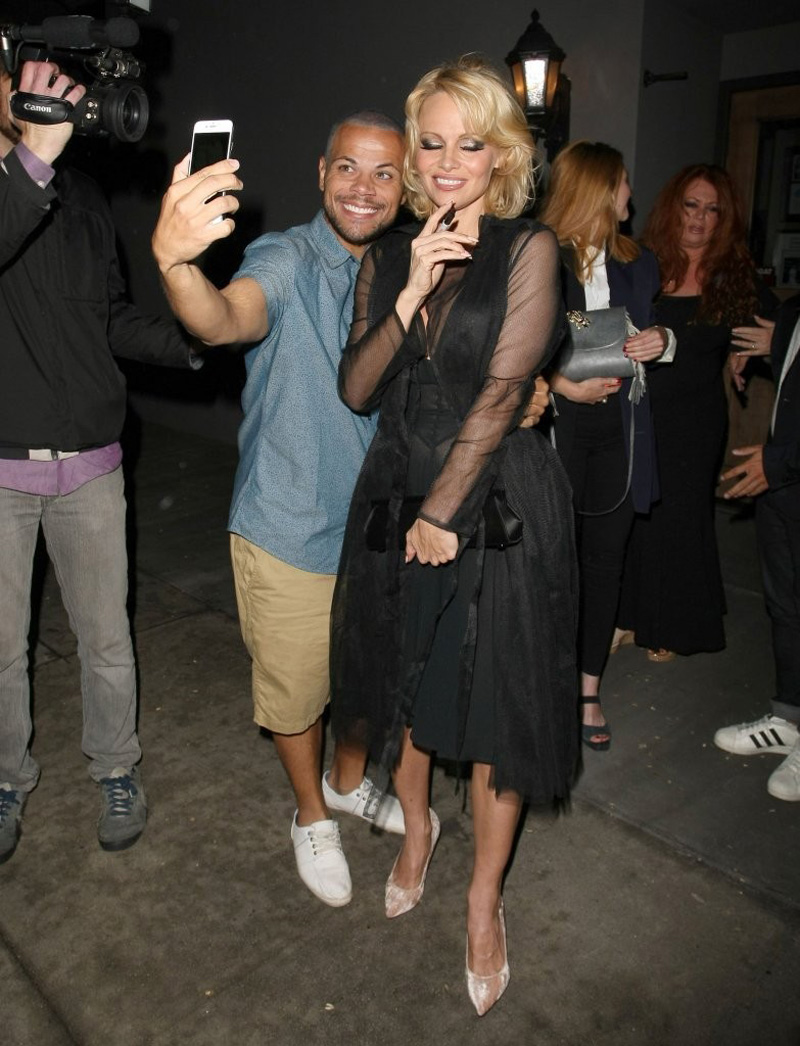 Pam Anderson Braless in Sheer Lace Blouse