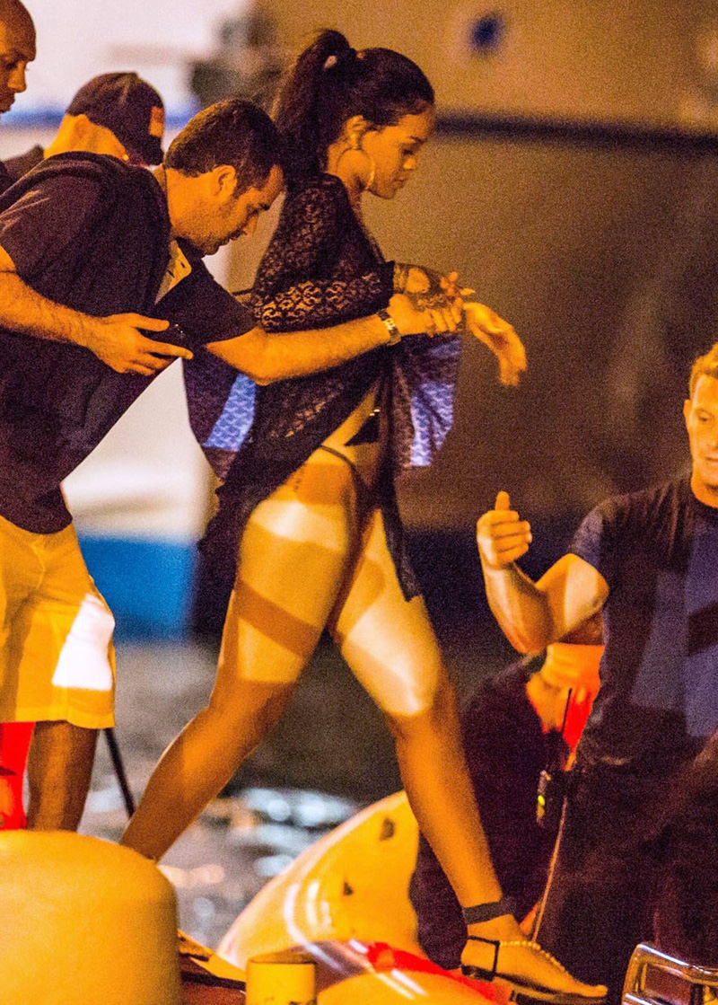 Rihanna Braless in Black Lace Robe on Vacation