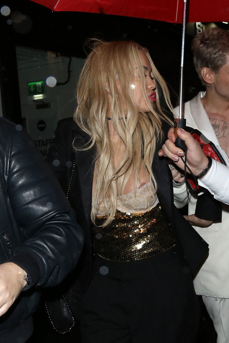 Rita Ora Areola Peek from her White Lacey Bra