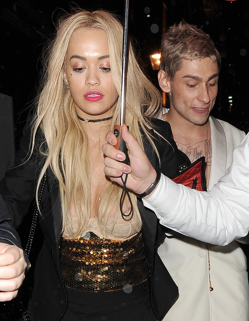 Rita Ora Areola Peek from her White Lacey Bra