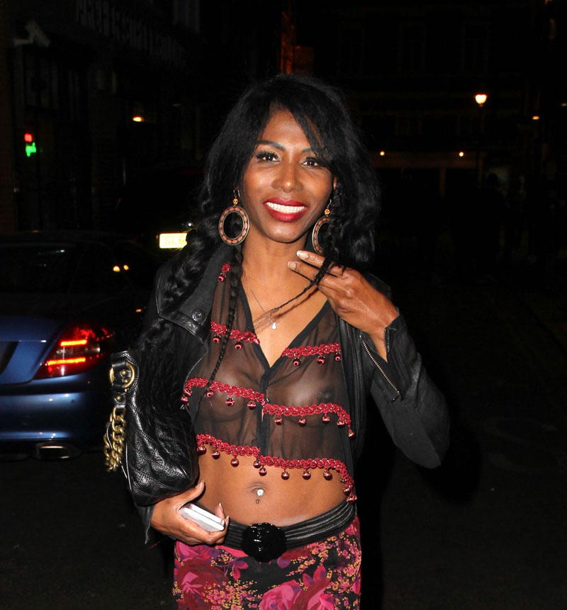 Sinitta Braless in Totally See Through Black Blouse