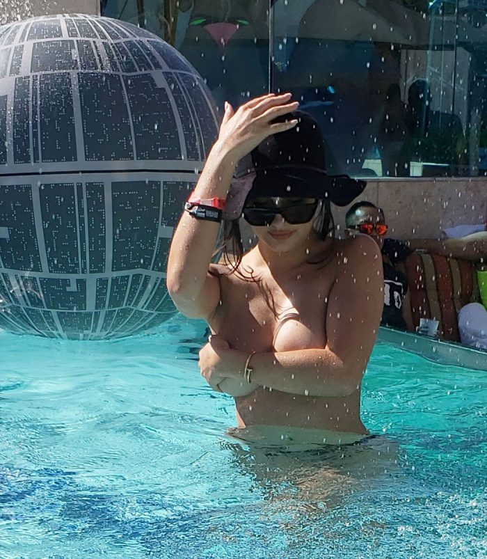 Tao Wickrath Topless in a Public Pool