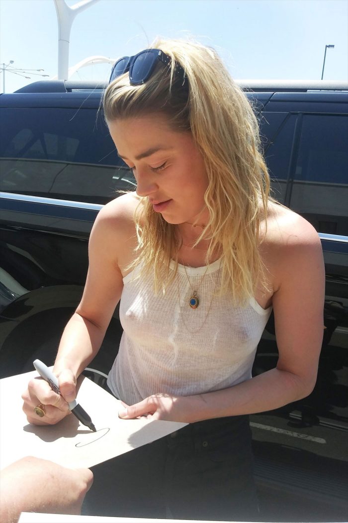Amber Heard Braless Boobs in a Wife Beater