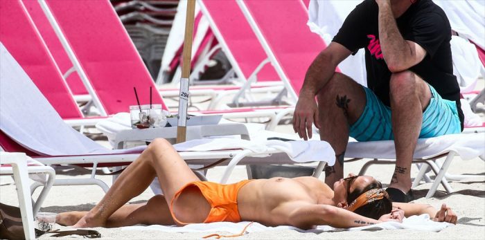 Kristen Doute Caught Topless Sunbathing on the Beach