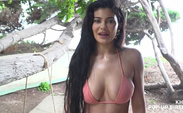 Kylie Jenner Screen Shots from E! in a Bikini Top