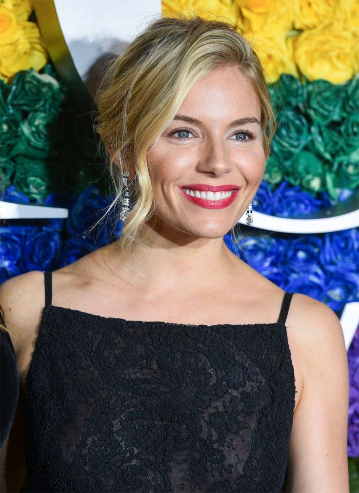 Sienna Miller in Sheer Black Evening Gown