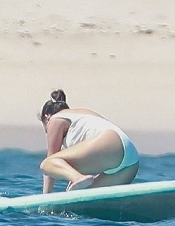 Selena Gomez White Bathingsuit at the Beach