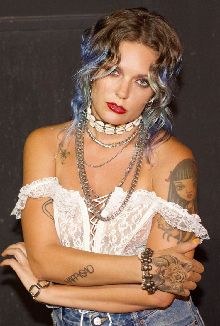 Tove Lo Posing Braless in White Lace Corset