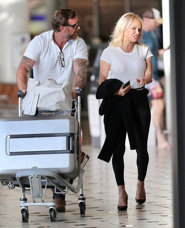 Pamela Anderson in a Sheer White Tee and Sheer White Bra