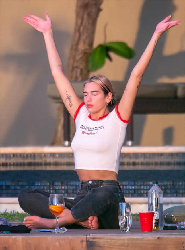 Dua Lipa Braless Breasts in a Thin White Shirt