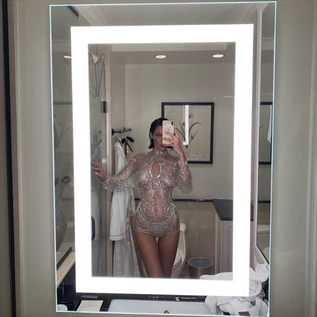 Bella Hadid Posing in a Clear Blue Bodysuit