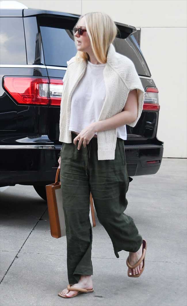 Dakota Fanning Braless Nipple Pokies in White T-Shirt