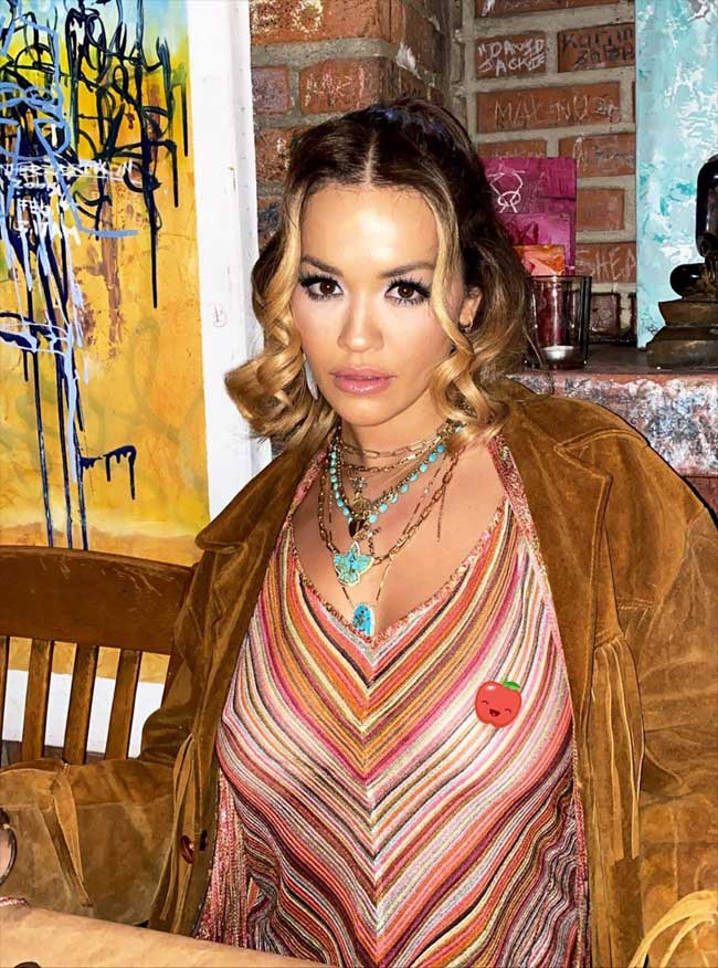 Rita Ora Braless in Sheer Rainbow Shirt