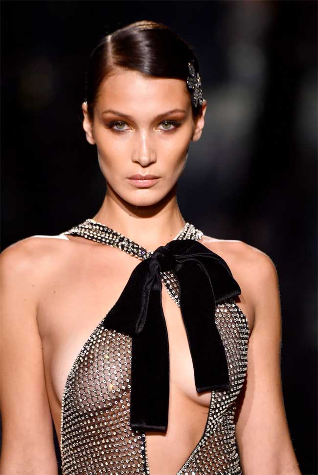 Bella Hadid Hits the Catwalk in a Sheer Black Gown