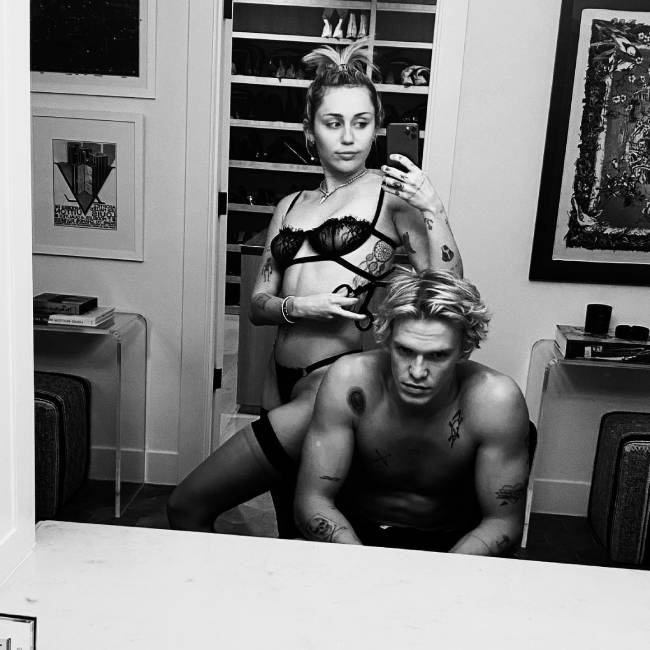 Miley Cyrus in Black Lingerie with Cody Simpson