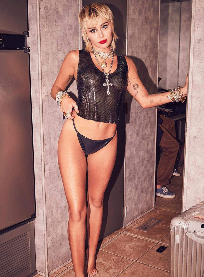 Miley Cyrus Braless in Sheer Black Top and Matching Thong