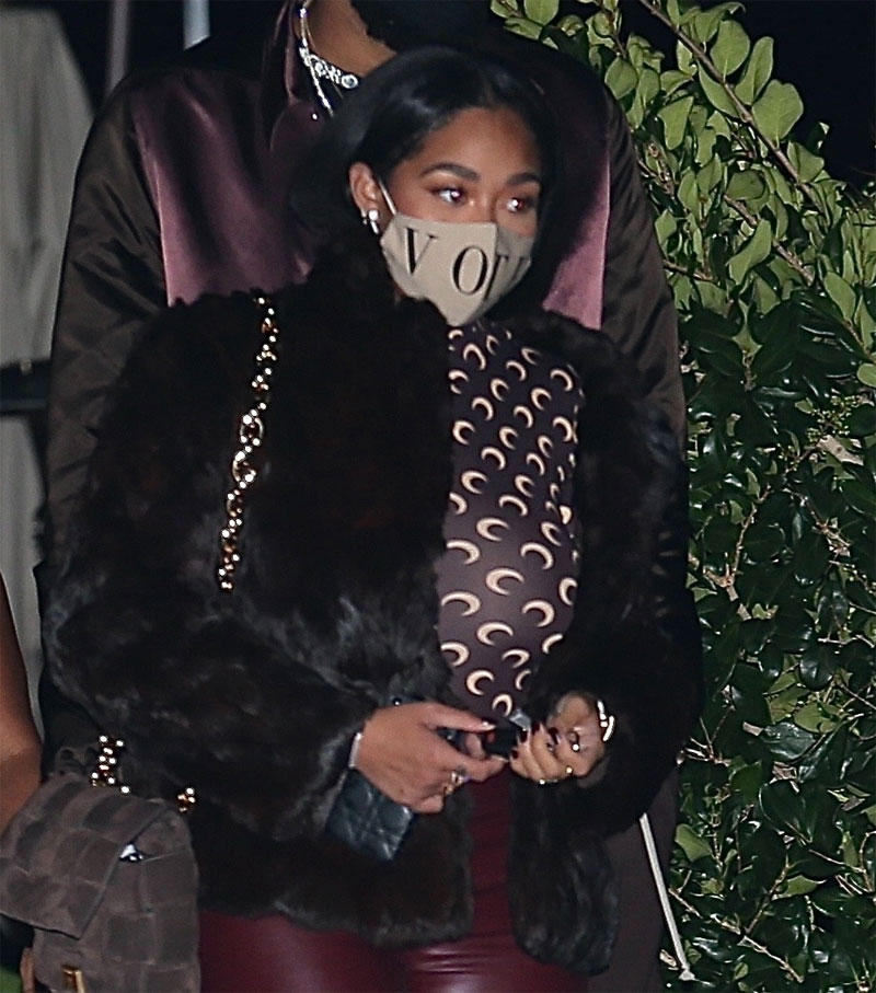 Jordyn Woods Braless in a Sheer Black Top and Leather Jacket